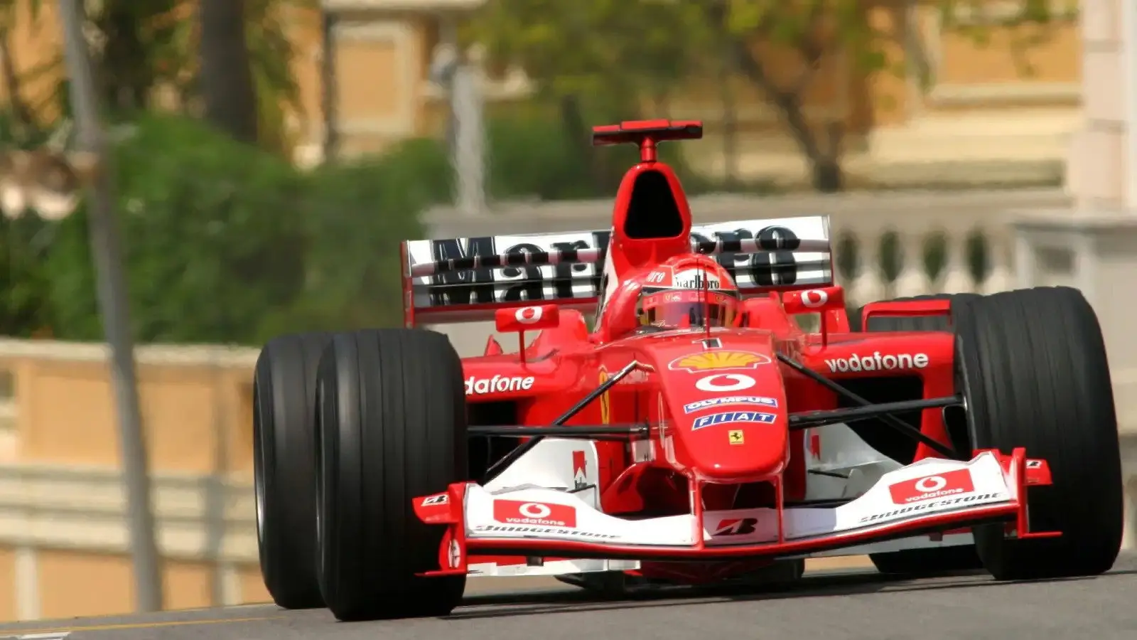 Michael & Co. The Dream Team: The Official Review Of The 2003 FIA Formula One World Championship backdrop